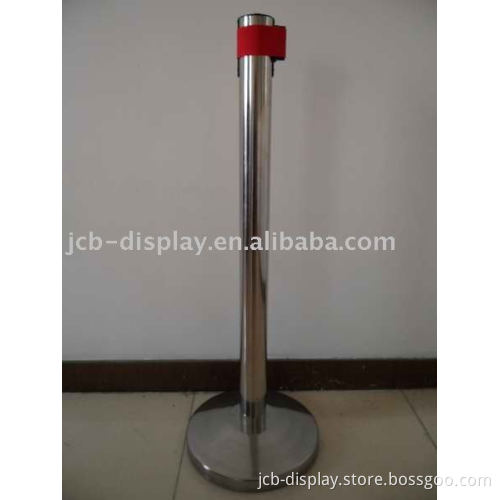 polished stainless steel post with red belt pedestrian barrier